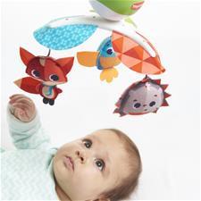 Charming Cot Accessories and Nursery Mobiles with colorful animal toys above a baby.