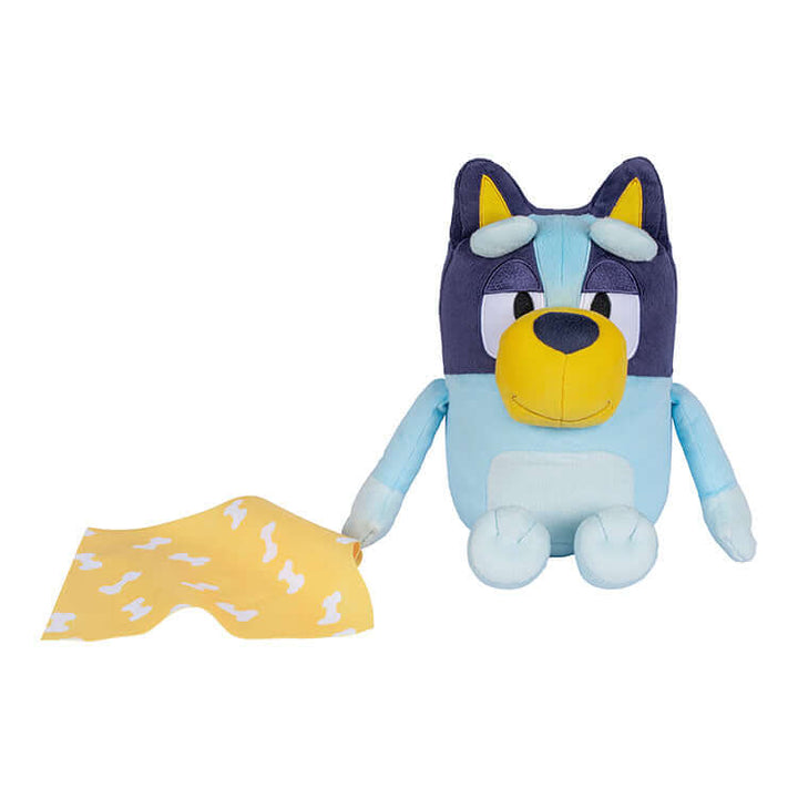 Sleepytime Bluey plush toy with blanket, features sleepy eyes and multilingual sound effects in English, French, and Spanish.