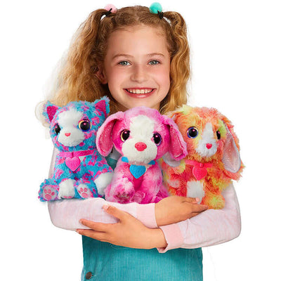 Girl holding Little Live Scruff-A-Luvs S11 Neon Pets, including a neon Puppy, Kitty, and Bunny, against a white background.