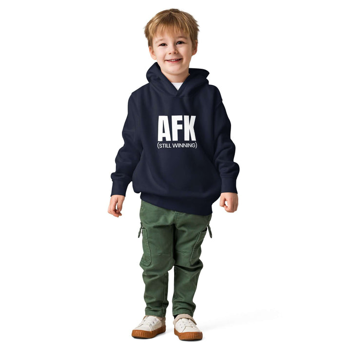 AFK Toddler fleece pullover hoodie worn by a smiling boy in a navy hoodie and green pants.