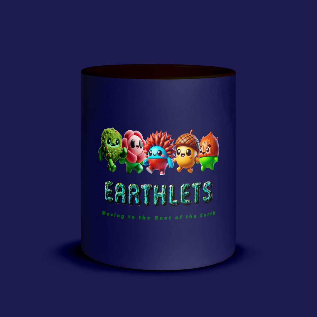 Colorful Earthlets ceramic mug featuring playful characters and the text 'Earthlets Moving to the Beat of the Earth'.
