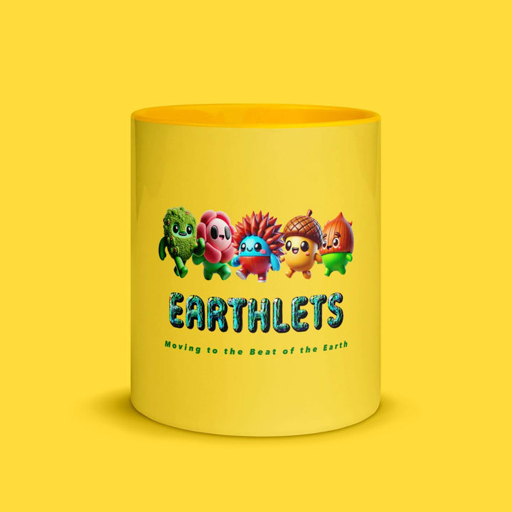 Earthlets mug featuring colorful characters and the slogan 'Moving to the Beat of the Earth' on a yellow background.