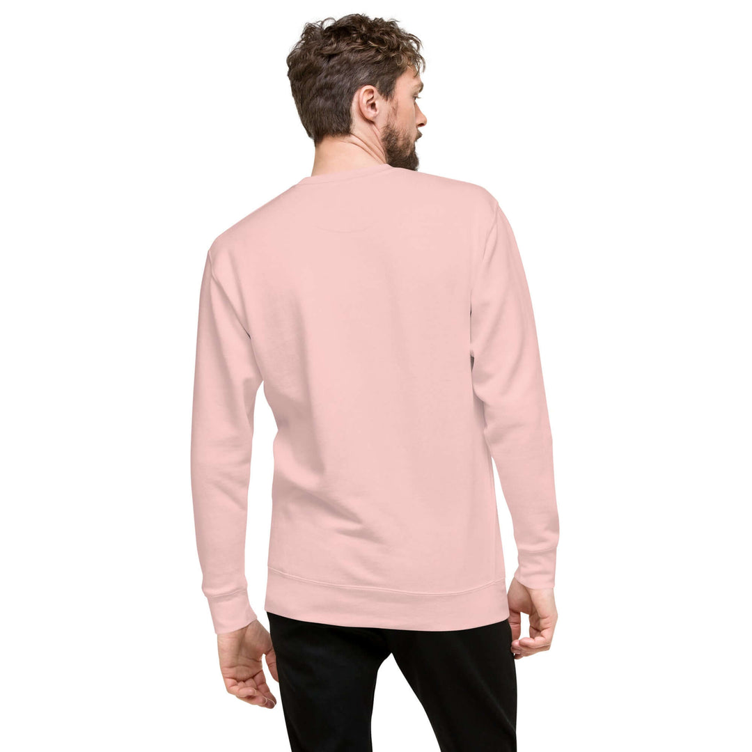 Back view of a man wearing the Earthlets Unisex Premium Sweatshirt in pink, showcasing its casual style.