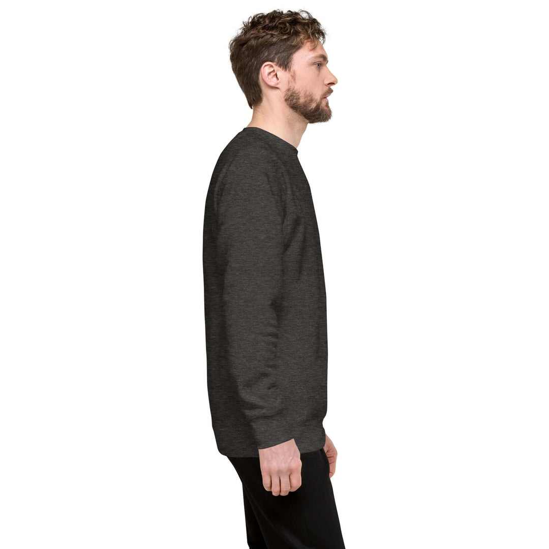 Earthlets Unisex Premium Sweatshirt shown on a model in profile view featuring a classic streetwear design.