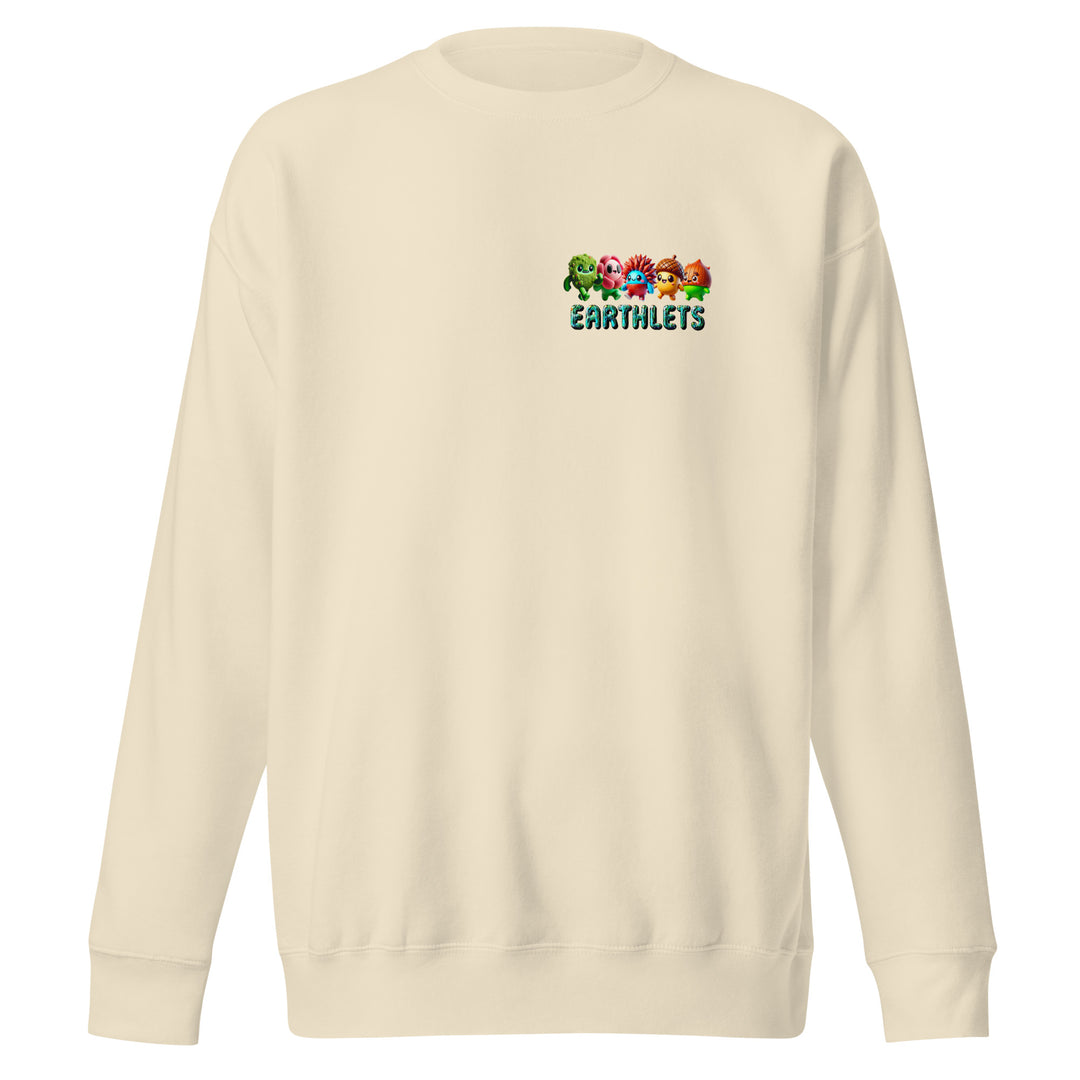 Earthlets unisex premium sweatshirt in cream color with logo design featuring colorful characters.