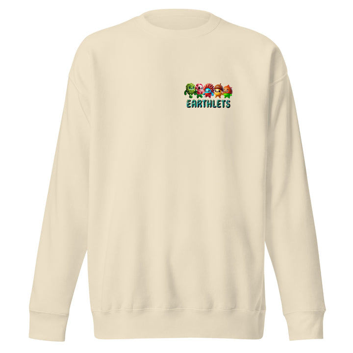 Earthlets unisex premium sweatshirt in cream color with logo design featuring colorful characters.