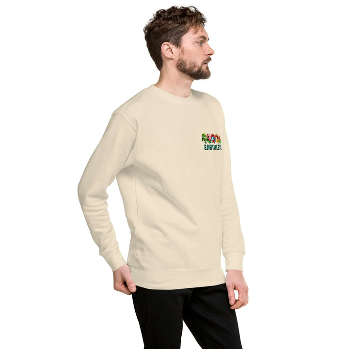 Earthlets Unisex Premium Sweatshirt model wearing light-colored sweatshirt with graphic design on the chest.