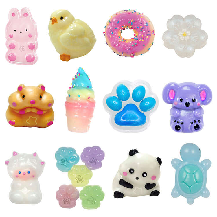 Colorful collection of Taba World Ready-Made Mystery Tabas including animals, flowers, and desserts